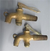 (2) Vintage brass spickets.