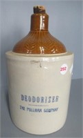 Vintage Pullman railroad deodorizer jug. Measures: