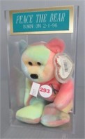 TY Beanie Baby Peace the Bear in display.