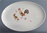 Vintage rooster and hen pottery platter.