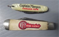 (2) Vintage advertising knives with mother of