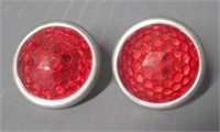 (2) Vintage License Plate Red Reflectors.