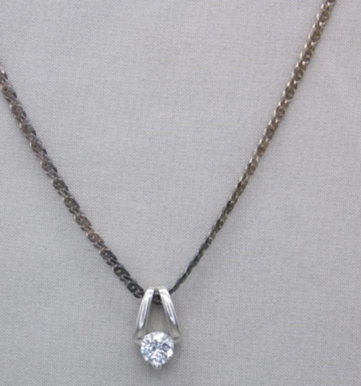 Sterling Silver chain with pendant. Weight 6.17