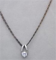 Sterling Silver chain with pendant. Weight 6.17