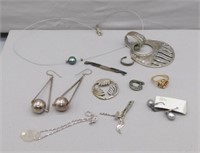 Sterling Silver includes toll brooch, earrings,