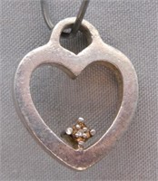 Sterling Silver heart pendant. Weight 3.49 grams.