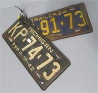 Pair of 1942 and 1945 Michigan license plates.