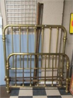 Full size brass bed.