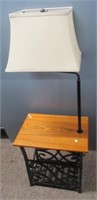 Wood and metal table lamp. Measures: 54" Tall.