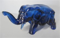 Blue glass lidded elephant jar. Measures: 4" H x
