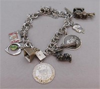 Sterling Silver charm bracelet. Weight 39.58