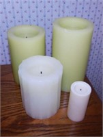 4 battery operated pillar candles, tallest is