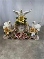 Porcelain dove and floral mantle clock, 19 inches