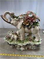 Porcelain elephants statue with floral