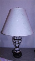 Porcelain table lamp w/ cherubs & fabric shade,