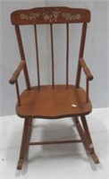 Vintage wood child's rocking chair.