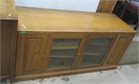 Entertainment center. Measures: 28.5" H x 60" W.