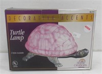 Turtle lamp in box.
