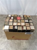 Assortment of vintage piano rolls and word rolls