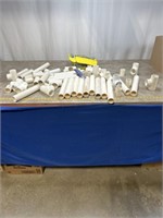 Assortment of plumbing pvc tubes and T pipes,