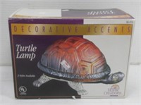 Turtle lamp in box.