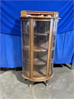 Glass and wood rounded display case with wood