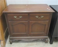 Vintage wood music cabinet with pull down front.