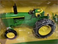 John Deere 2020 tractor w/chains & grader blade