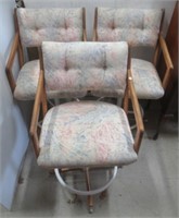 (3) Upholstered swivel chairs.