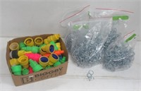 Box of safety spouts and (4) bags of peg board