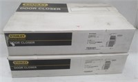 (2) Cases of Stanley security door closers. No.