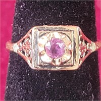 14k Ring with mauve (purplish pink) colored