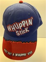 Whooping stick, adjustable ball cap appears in