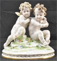 European Porcelain Cherub Figure Statue