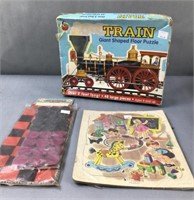 Giant train puzzle, old checkers, and playskool