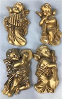 Ceramic gold babies playing instruments