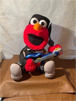 Vintage Elmo sings and plays guitar