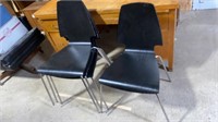 >4 Black Stackable Chairs