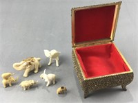 Metal chest & elephant contents