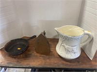 Vintage cast iron items and blue bridge pottery