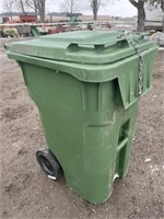 Green garbage bin