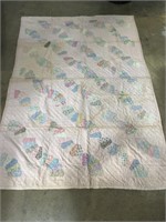 Quilt approximately 35 x 79 “ and cast iron