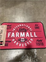 International Harvester door mat 
30”x17.7”