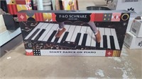 F.A.O Schwartz gaint dance on piano