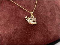 14 kt Gold necklace with a dove pendant, 14kt gold