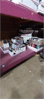 Lot with vhs movies, dvd's cassette tapes, and