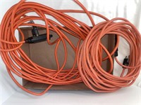 Pair of outdoor extension cords.