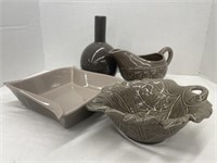 4 similar grey ceramic pieces