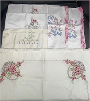 3 sets of embroidered pillow shams and a