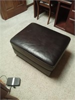 A leather footstool
25.5
15
24